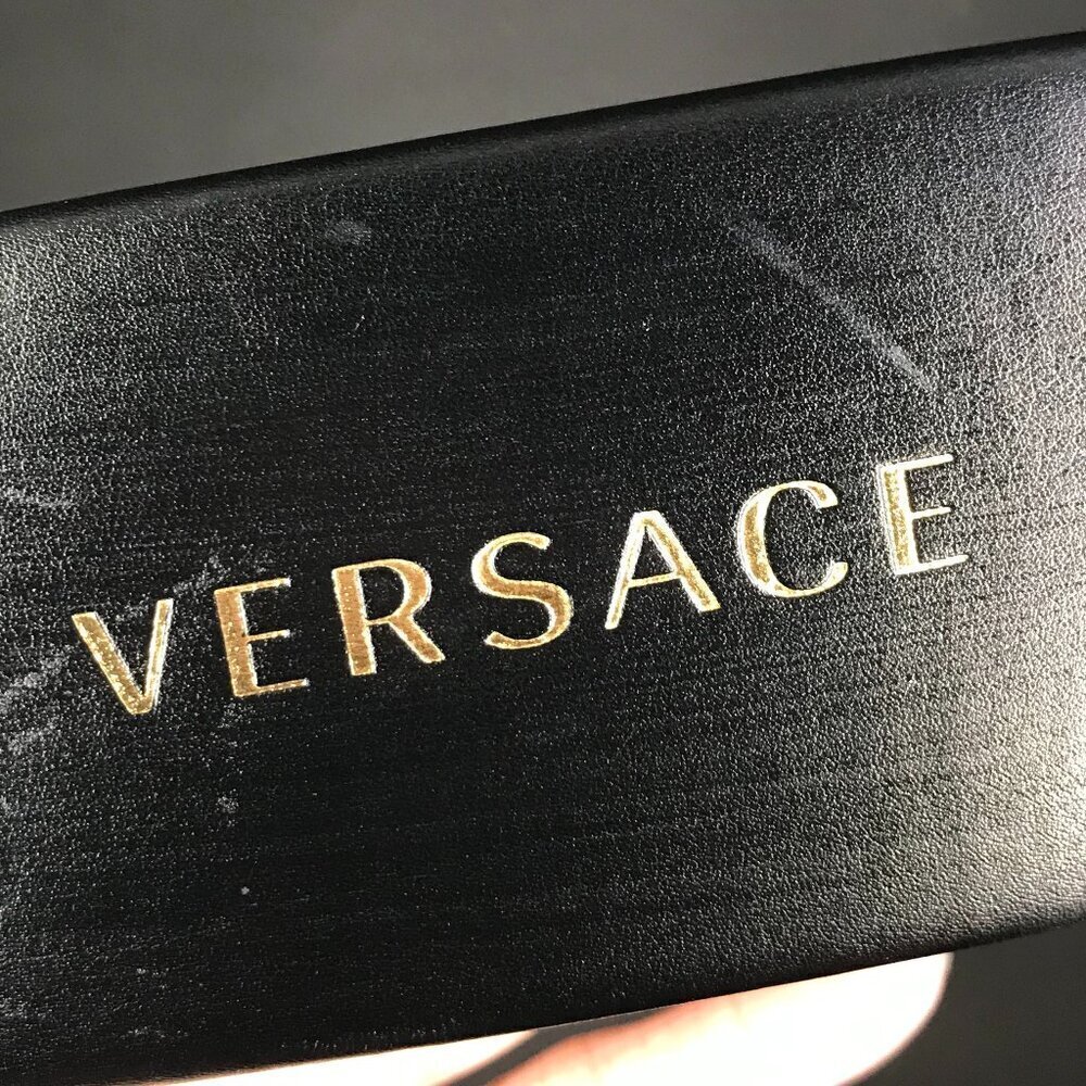 VERSACE authentic hard sided sunglass/eyeglass case wrapped in leather.  Black